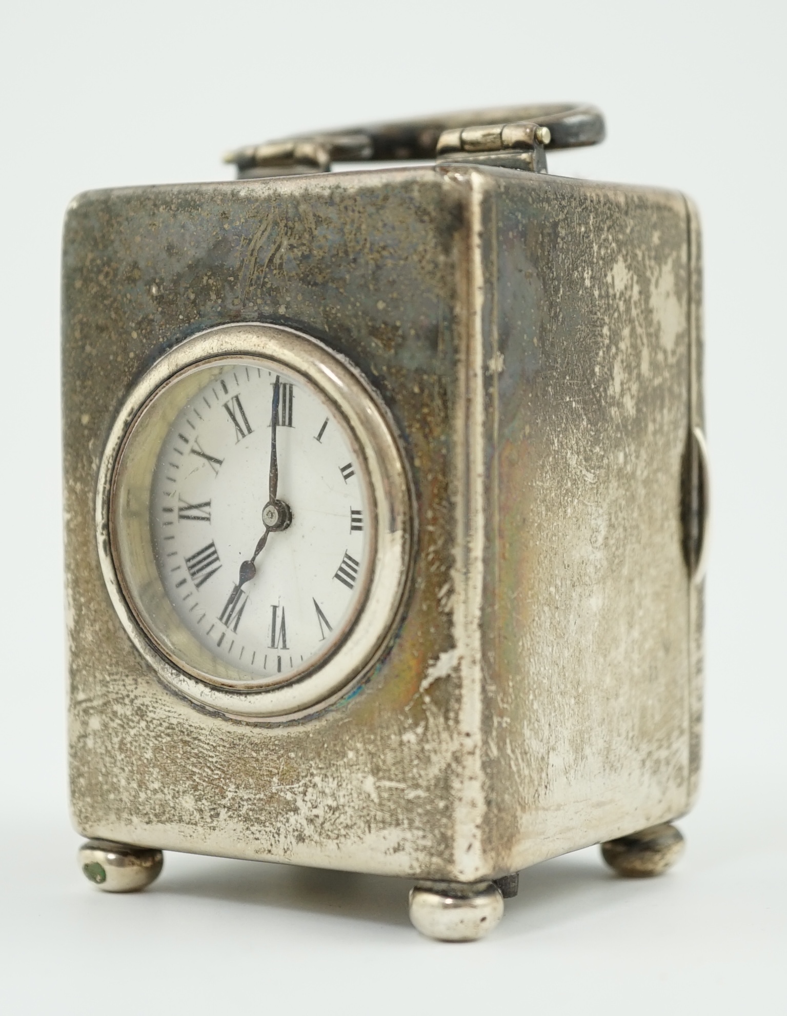 An Edwardian silver miniature carriage timepiece, by William Comyns